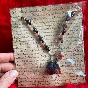 Genuine Pearl (and other beads) necklace.